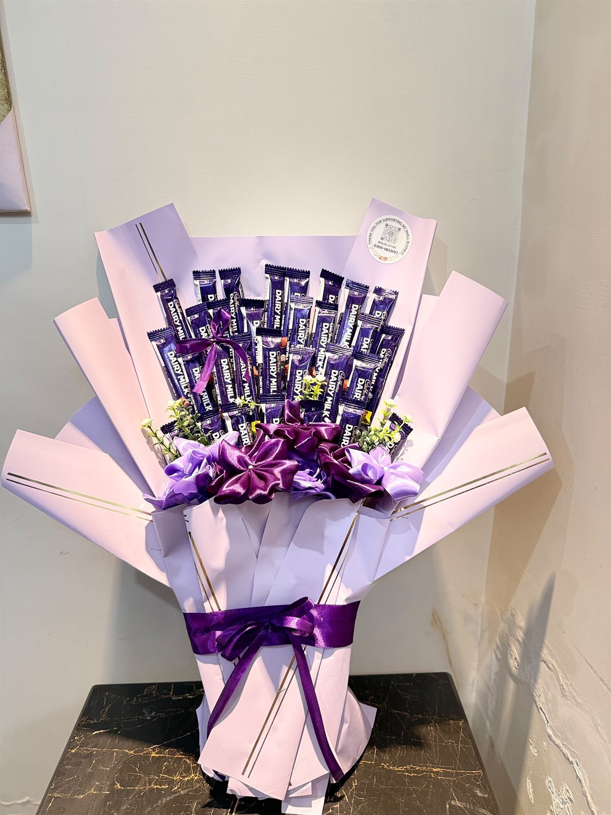 Purple satin rose and chocolate bouquet detail by DS Lush